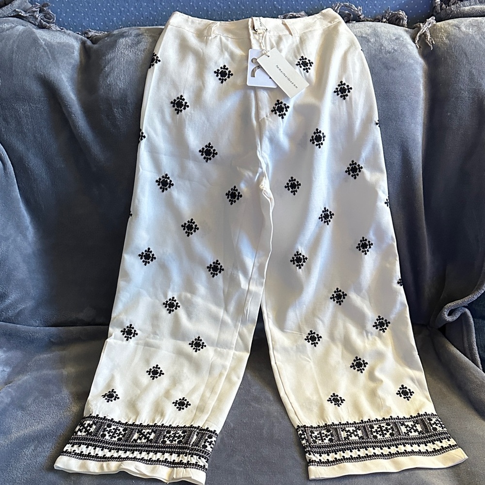 The COMMENSE 
OFF White Pants with Black Embroidery